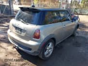 ✅ 2007 MINI Hardtop S • VIN: WMWMF73597TV31946 • Lot: 41588136. Listed on IAAI with 150,337 mi. Free auction sales archive from the USA and detailed vehicle history report at DreamBid. Image 4.