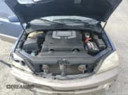 ✅ 2003 Kia Sorento LX • VIN: KNDJD733835040437 • Лот: 75985824. Опубликован ранее на Copart с пробегом 102 791 миль. Бесплатный доступ к архиву аукционных продаж из США и подробный отчёт об истории автомобиля на DreamBid. Изображение 13.