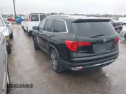 ✅ 2018 Honda Pilot Touring • VIN: 5FNYF5H99JB017044 • Lot: 43821143. Listed on IAAI with 156,739 mi. Free auction sales archive from the USA and detailed vehicle history report at DreamBid. Image 3.