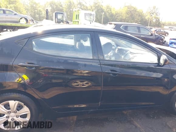 ✅ 2016 Hyundai Elantra SE • VIN: 5NPDH4AE1GH668592 • Lot: 42849781. Listed on IAAI with 121,250 mi. Free auction sales archive from the USA and detailed vehicle history report at DreamBid. Image 13.