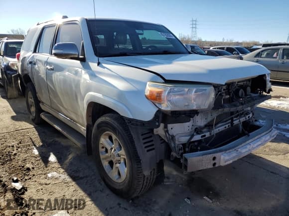 ✅ 2013 Toyota 4Runner SR5 • VIN: JTEBU5JR5D5125734 • Lot: 43162605. Listed on Copart with 135,534 mi. Free auction sales archive from the USA and detailed vehicle history report at DreamBid. Image 4.