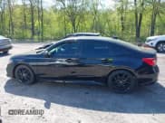 ✅ 2023 Honda Civic Sport • VIN: 2HGFE2F57PH530869 • Lot: 42232920. Listed on IAAI with 62,792 mi. Free auction sales archive from the USA and detailed vehicle history report at DreamBid. Image 14.