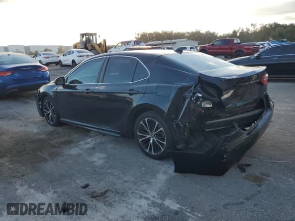 ✅ 2019 Toyota Camry SE • VIN: 4T1B11HK5KU736442 • Лот: 91657915. Опубликован ранее на Copart с пробегом 101 642 миль. Бесплатный доступ к архиву аукционных продаж из США и подробный отчёт об истории автомобиля на DreamBid. Изображение 2.