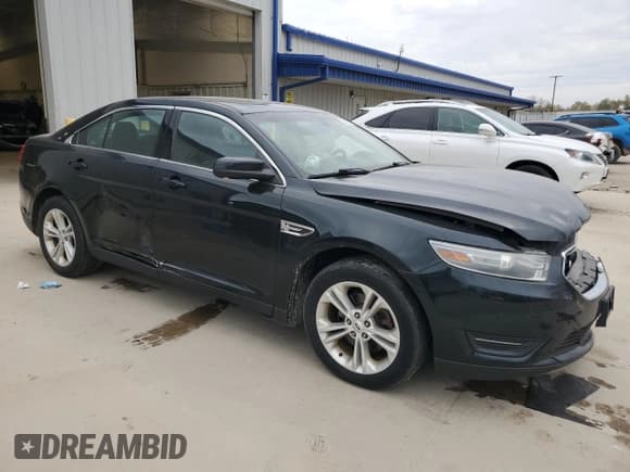 ✅ 2014 Ford Taurus SEL • VIN: 1FAHP2E80EG133340 • Lot: 90866975. Listed on Copart with 162,831 mi. Free auction sales archive from the USA and detailed vehicle history report at DreamBid. Image 4.