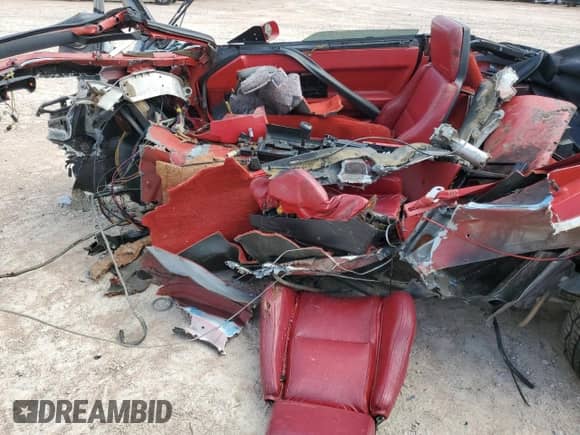 1987 Chevrolet Corvette z VIN 1G1YY3183H5127351, wystawiony jako Copart lot #72077725 z przebiegiem Nie podano mil oraz Szkoda całkowita • Salvage title. Historia ofert i sprzedaży dostępna na DreamBid. Obrazek 7.