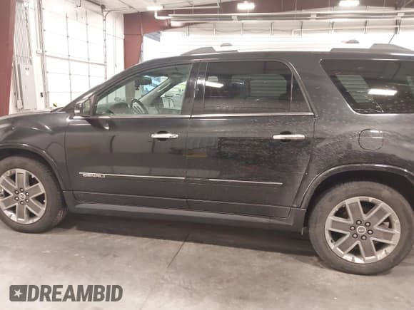 ✅ 2012 GMC Acadia Denali • VIN: 1GKKVTED8CJ211117 • Lot: 43814191. Listed on IAAI with 202,789 mi. Free auction sales archive from the USA and detailed vehicle history report at DreamBid. Image 14.