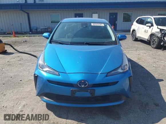 2021 Toyota Prius L Eco with VIN JTDKAMFU8M3140891, listed as a Copart auction lot 80926285 with 91,047 mi miles and Salvage title. Bid and sale history available at DreamBid. Image 5.