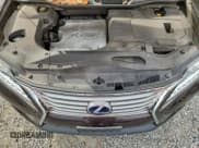 ✅ 2014 Lexus RX 450h • VIN: JTJBC1BA0E2454897 • Lot: 95890855. Wystawiony na Copart z przebiegiem 161 895 mil. Bezpłatny archiwum sprzedaży aukcyjnych z USA i szczegółowy raport historii pojazdu na DreamBid. Zdjęcie 11.