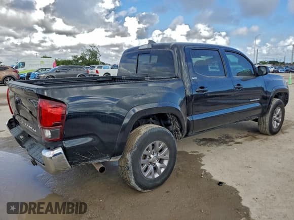 ✅ 2018 Toyota Tacoma TRD Sport • VIN: 3TMAZ5CN5JM066203 • Lot: 93886135. Listed on Copart with 83,867 mi. Free auction sales archive from the USA and detailed vehicle history report at DreamBid. Image 3.