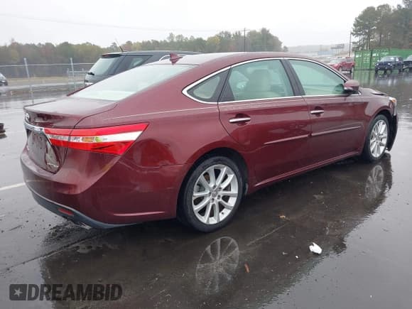 ✅ 2014 Toyota Avalon XLE Premium • VIN: 4T1BK1EB6EU099437 • Lot: 43540906. Listed on IAAI with 138,337 mi. Free auction sales archive from the USA and detailed vehicle history report at DreamBid. Image 4.