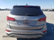 ✅ 2017 Hyundai Santa Fe 2.4L • VIN: 5XYZU3LB5HG422829 • Лот: 43413654. Опубликован ранее на Copart с пробегом 128 799 миль. Бесплатный доступ к архиву аукционных продаж из США и подробный отчёт об истории автомобиля на DreamBid. Изображение 6.