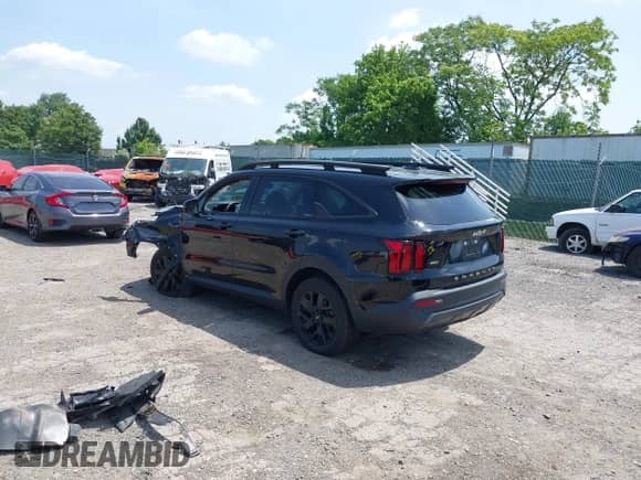 2022 Kia Sorento X-Line S z VIN 5XYRLDLC9NG149780, wystawiony jako IAAI lot #42567100 z przebiegiem 62 097 mil mil oraz . Historia ofert i sprzedaży dostępna na DreamBid. Obrazek 3.