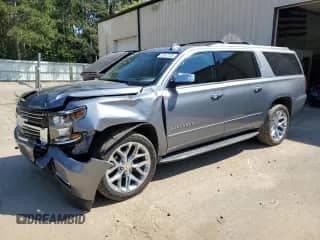 2020 Chevrolet Suburban Premier z VIN 1GNSKJKC0LR123871, wystawiony jako Copart lot #70747725 z przebiegiem 96 478 mil mil oraz Szkoda całkowita • Salvage title. Historia ofert i sprzedaży dostępna na DreamBid. Obrazek 1.