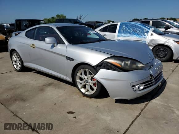 2008 Hyundai Tiburon GT z VIN KMHHN66F98U267849, wystawiony jako Copart lot #88506815 z przebiegiem 92 820 mil mil oraz Szkoda całkowita • Salvage title. Historia ofert i sprzedaży dostępna na DreamBid. Obrazek 4.