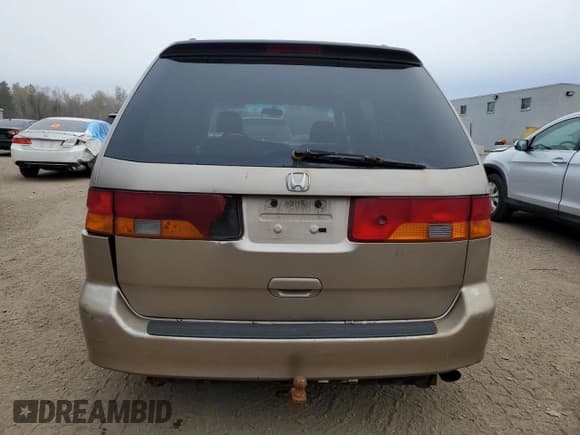 ✅ 2003 Honda Odyssey EX • VIN: 2HKRL18613H013103 • Lot: 90668365. Wystawiony na Copart z przebiegiem 301 152 mil. Bezpłatny archiwum sprzedaży aukcyjnych z USA i szczegółowy raport historii pojazdu na DreamBid. Zdjęcie 6.