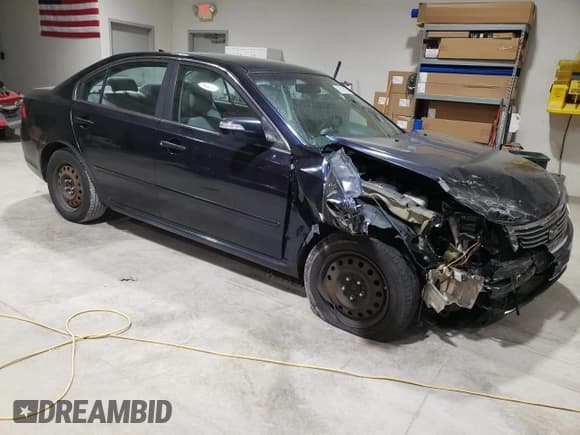 ✅ 2009 Kia Optima LX • VIN: KNAGE228695363723 • Лот: 93146205. Опубликован ранее на Copart с пробегом 186 543 миль. Бесплатный доступ к архиву аукционных продаж из США и подробный отчёт об истории автомобиля на DreamBid. Изображение 4.