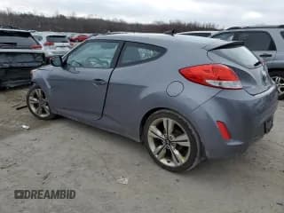 ✅ 2017 Hyundai Veloster • VIN: KMHTC6AD1HU316323 • Lot: 87031324. Wystawiony na Copart z przebiegiem 62 330 mil. Bezpłatny archiwum sprzedaży aukcyjnych z USA i szczegółowy raport historii pojazdu na DreamBid. Zdjęcie 2.