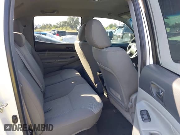 ✅ 2015 Toyota Tacoma PreRunner • VIN: 5TFKU4HN6FX006874 • Lot: 43090148. Listed on IAAI with 182,527 mi. Free auction sales archive from the USA and detailed vehicle history report at DreamBid. Image 8.