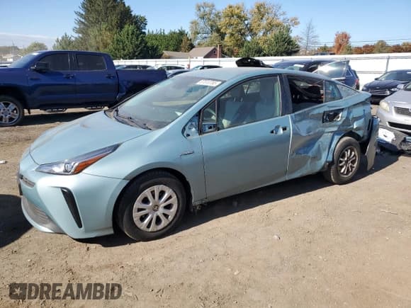 ✅ 2020 Toyota Prius LE • VIN: JTDKARFU9L3114988 • Lot: 87010785. Listed on Copart with 96,022 mi. Free auction sales archive from the USA and detailed vehicle history report at DreamBid. Image 1.