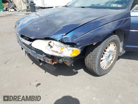 ✅ 2002 Chevrolet Monte Carlo LS • VIN: 2G1WW12E229348276 • Lot: 43072263. Listed on IAAI with 112,372 mi. Free auction sales archive from the USA and detailed vehicle history report at DreamBid. Image 13.