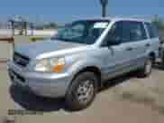 2003 Honda Pilot LX with VIN 2HKYF18153H570037, listed as a IAAI auction lot 42614460 with 258,017 mi miles and . Bid and sale history available at DreamBid. Image 2.