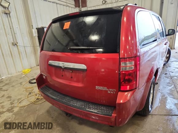 ✅ 2009 Dodge Grand Caravan SXT • VIN: 2D8HN54199R530525 • Лот: 87399245. Опубликован ранее на Copart с пробегом 201 928 миль. Бесплатный доступ к архиву аукционных продаж из США и подробный отчёт об истории автомобиля на DreamBid. Изображение 6.