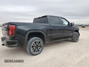 ✅ 2021 GMC Sierra 1500 AT4 • VIN: 1GTP9EEL0MZ385047 • Lot: 82707664. Wystawiony na Copart z przebiegiem 46 921 mil. Bezpłatny archiwum sprzedaży aukcyjnych z USA i szczegółowy raport historii pojazdu na DreamBid. Zdjęcie 3.