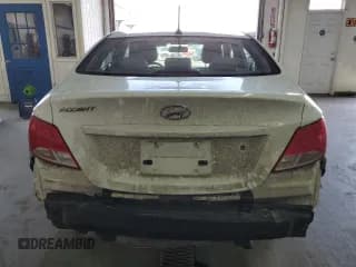 ✅ 2015 Hyundai Accent GLS • VIN: KMHCT4AE3FU883918 • Lot: 69941963. Wystawiony na Copart z przebiegiem 187 181 mil. Bezpłatny archiwum sprzedaży aukcyjnych z USA i szczegółowy raport historii pojazdu na DreamBid. Zdjęcie 6.