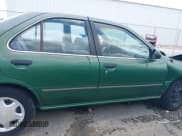 ✅ 1998 Nissan Sentra XE • VIN: 3N1AB41D4WL064404 • Lot: 42787154. Listed on IAAI with 265,737 mi. Free auction sales archive from the USA and detailed vehicle history report at DreamBid. Image 14.