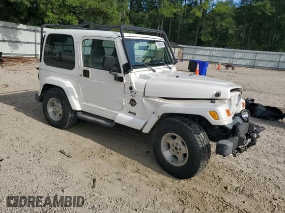 ✅ 2000 Jeep Wrangler Sahara • VIN: 1J4FA59S6YP762125 • Лот: 70583245. Опубликован ранее на Copart с пробегом 143 816 миль. Бесплатный доступ к архиву аукционных продаж из США и подробный отчёт об истории автомобиля на DreamBid. Изображение 4.