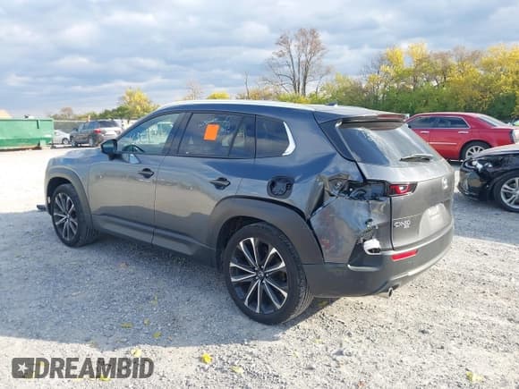 ✅ 2025 Mazda CX-50 S Premium Plus • VIN: 7MMVABEM8SN373156 • Лот: 43582168. Опубликован ранее на IAAI с пробегом 8 594 миль. Бесплатный доступ к архиву аукционных продаж из США и подробный отчёт об истории автомобиля на DreamBid. Изображение 3.