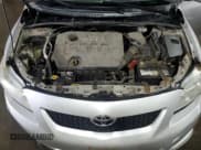 ✅ 2010 Toyota Corolla LE • VIN: 1NXBU4EE2AZ236891 • Lot: 67538195. Wystawiony na Copart z przebiegiem 253 337 mil. Bezpłatny archiwum sprzedaży aukcyjnych z USA i szczegółowy raport historii pojazdu na DreamBid. Zdjęcie 11.