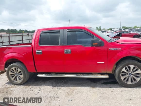 ✅ 2014 Ford F-150 XL • VIN: 1FTFW1CT1EKF20949 • Lot: 42344583. Listed on IAAI with 218,122 mi. Free auction sales archive from the USA and detailed vehicle history report at DreamBid. Image 13.