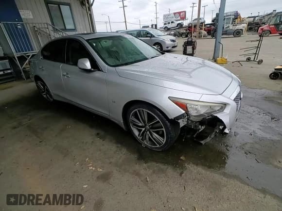 ✅ 2015 Infiniti Q50 Premium • VIN: JN1BV7AP1FM346979 • Lot: 55667695. Listed on Copart with 117,907 mi. Free auction sales archive from the USA and detailed vehicle history report at DreamBid. Image 14.