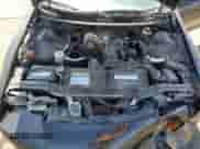 1997 Chevrolet Camaro z VIN 2G1FP22K9V2126324, wystawiony jako Copart lot #60117095 z przebiegiem 179 786 mil mil oraz Szkoda całkowita • Salvage title. Historia ofert i sprzedaży dostępna na DreamBid. Obrazek 11.