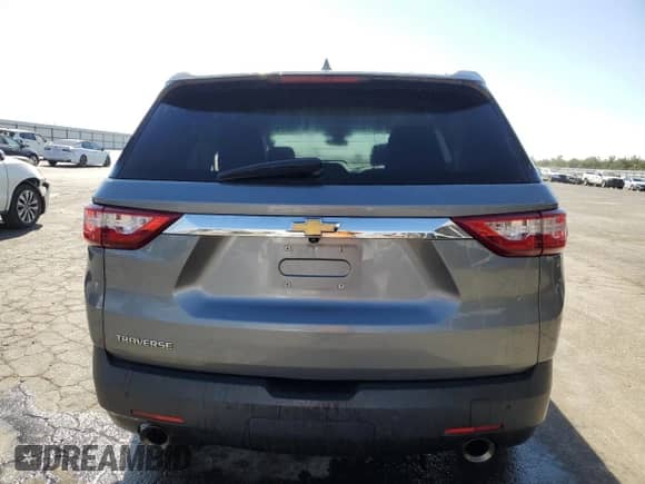 2020 Chevrolet Traverse LS z VIN 1GNERLKW3LJ273020, wystawiony jako Copart lot #77422724 z przebiegiem 156 784 mil mil oraz Czysty tytuł • Clean title. Historia ofert i sprzedaży dostępna na DreamBid. Obrazek 6.