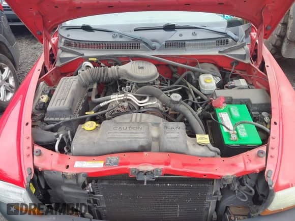 2002 Dodge Dakota Sport z VIN 1B7FL36X62S720322, wystawiony jako IAAI lot #42191267 z przebiegiem 108 191 mil mil oraz . Historia ofert i sprzedaży dostępna na DreamBid. Obrazek 10.