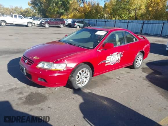 2001 Honda Accord EX z VIN 1HGCG22531A026926, wystawiony jako IAAI lot #43561897 z przebiegiem 318 749 mil mil oraz . Historia ofert i sprzedaży dostępna na DreamBid. Obrazek 2.