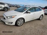 ✅ 2018 Ford Focus Titanium • VIN: 1FADP3J25JL314733 • Lot: 93067665. Wystawiony na Copart z przebiegiem 102 271 mil. Bezpłatny archiwum sprzedaży aukcyjnych z USA i szczegółowy raport historii pojazdu na DreamBid. Zdjęcie 1.