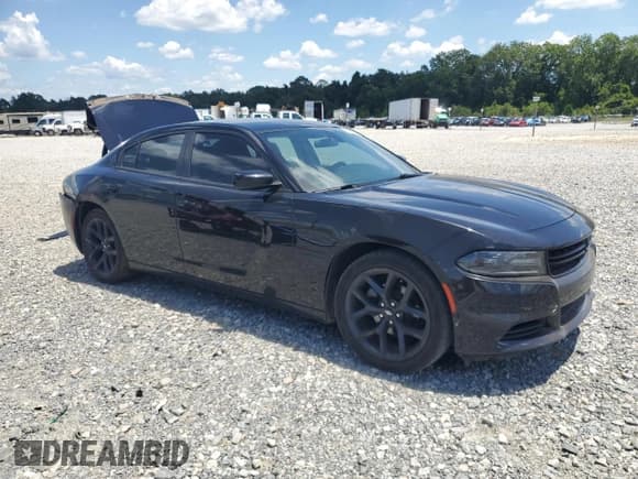 ✅ 2019 Dodge Charger SXT • VIN: 2C3CDXBGXKH715441 • Lot: 66681625. Listed on Copart with 132,912 mi. Free auction sales archive from the USA and detailed vehicle history report at DreamBid. Image 4.