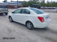 ✅ 2014 Chevrolet Sonic LT • VIN: 1G1JC5SH2E4218784 • Lot: 43681550. Listed on IAAI with 104,015 mi. Free auction sales archive from the USA and detailed vehicle history report at DreamBid. Image 3.