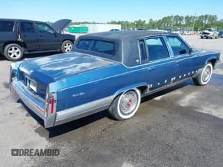 ✅ 1991 Cadillac Brougham • VIN: 1G6DW547XMR708197 • Лот: 42112042. Опубликован ранее на IAAI с пробегом Не указан. Бесплатный доступ к архиву аукционных продаж из США и подробный отчёт об истории автомобиля на DreamBid. Изображение 4.