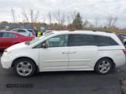 ✅ 2013 Honda Odyssey Touring • VIN: 5FNRL5H96DB052240 • Lot: 43570600. Listed on IAAI with 327,223 mi. Free auction sales archive from the USA and detailed vehicle history report at DreamBid. Image 14.