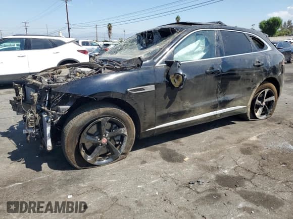 ✅ 2021 Jaguar F-Pace R-Dynamic S • VIN: SADCT2FUXMA669942 • Лот: 70152315. Опубликован ранее на Copart с пробегом 14 221 миль. Бесплатный доступ к архиву аукционных продаж из США и подробный отчёт об истории автомобиля на DreamBid. Изображение 1.