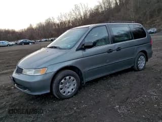 ✅ 1999 Honda Odyssey LX • VIN: 2HKRL1851XH516708 • Lot: 94859565. Listed on Copart with 110,256 mi. Free auction sales archive from the USA and detailed vehicle history report at DreamBid. Image 1.