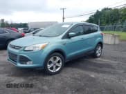 ✅ 2013 Ford Escape SE • VIN: 1FMCU9GX2DUC41058 • Lot: 42902425. Listed on IAAI with 109,278 mi. Free auction sales archive from the USA and detailed vehicle history report at DreamBid. Image 2.