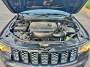 ✅ 2020 Jeep Grand Cherokee Altitude • VIN: 1C4RJFAG0LC147151 • Lot: 97057345. Listed on Copart with 159,896 mi. Free auction sales archive from the USA and detailed vehicle history report at DreamBid. Image 7.