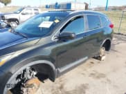 ✅ 2018 Honda CR-V Touring • VIN: 7FARW2H90JE052921 • Lot: 43671364. Listed on IAAI with 101,261 mi. Free auction sales archive from the USA and detailed vehicle history report at DreamBid. Image 16.