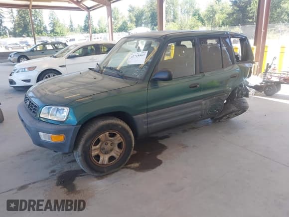 ✅ 1998 Toyota RAV4 • VIN: JT3GP10V4W0020180 • Lot: 42715463. Wystawiony na IAAI z przebiegiem 185 320 mil. Bezpłatny archiwum sprzedaży aukcyjnych z USA i szczegółowy raport historii pojazdu na DreamBid. Zdjęcie 2.