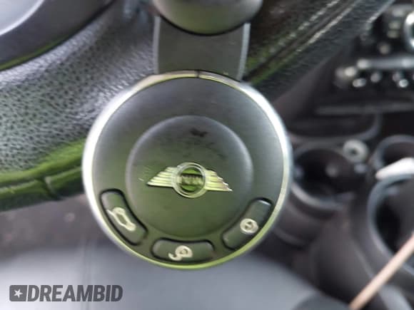 ✅ 2014 MINI Countryman S • VIN: WMWZC5C58EWM17886 • Lot: 43170727. Listed on IAAI with 114,582 mi. Free auction sales archive from the USA and detailed vehicle history report at DreamBid. Image 11.